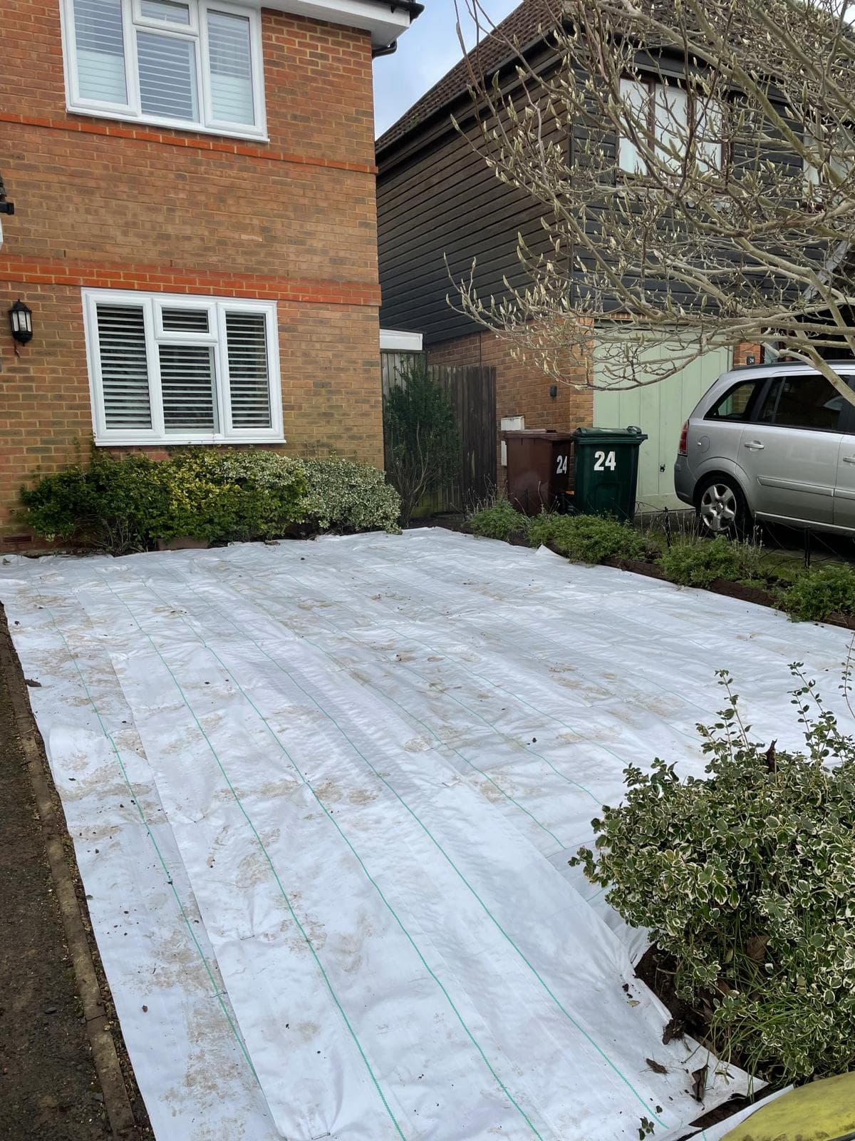 Front garden with weed membrane before gravel