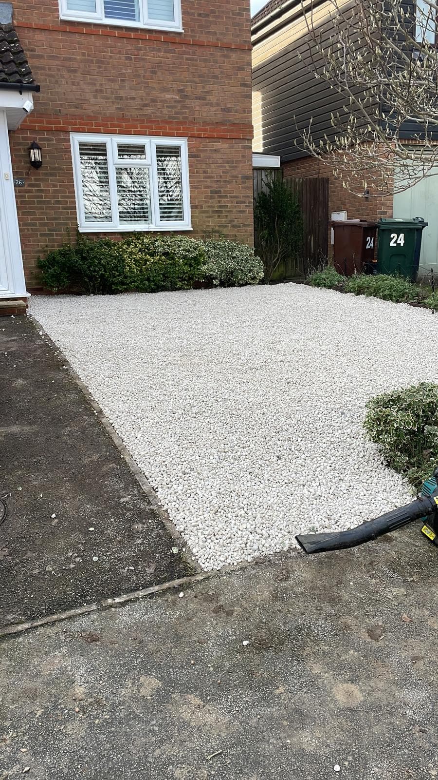Front garden with white gravel finish
