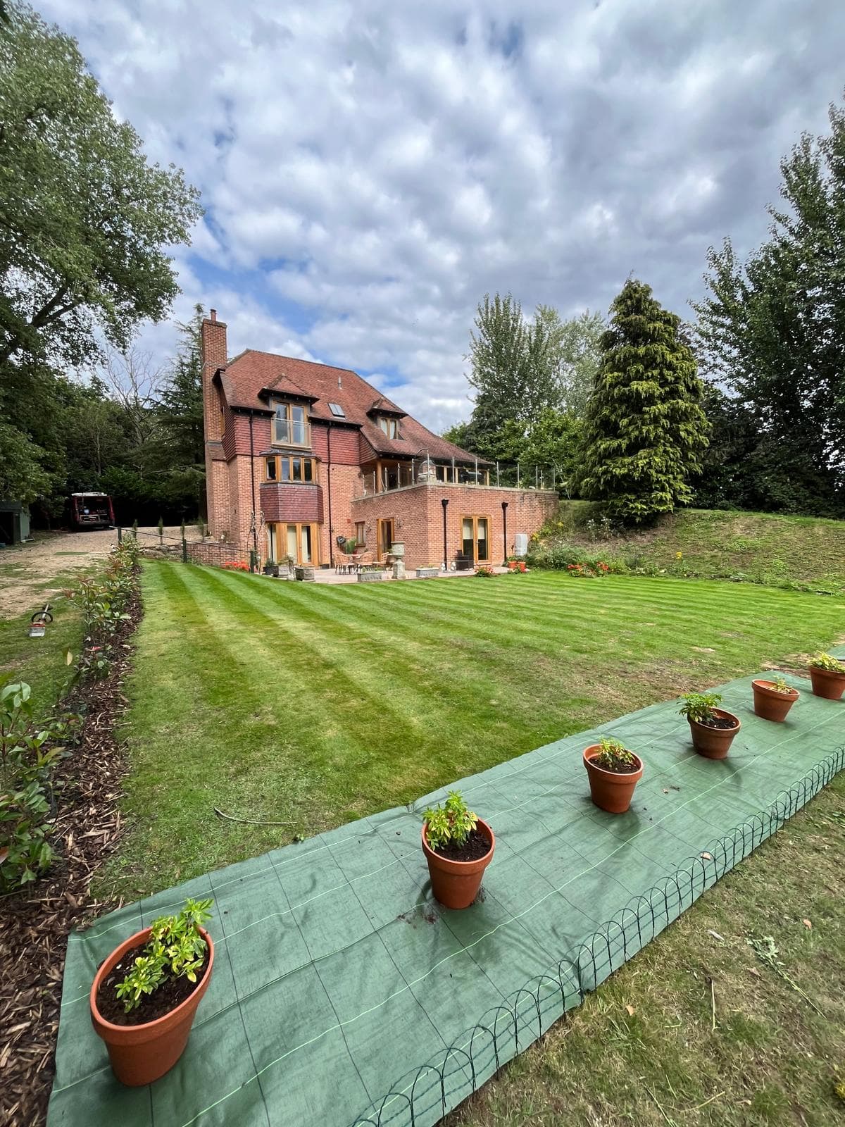 Garden prepared with membrane before turf