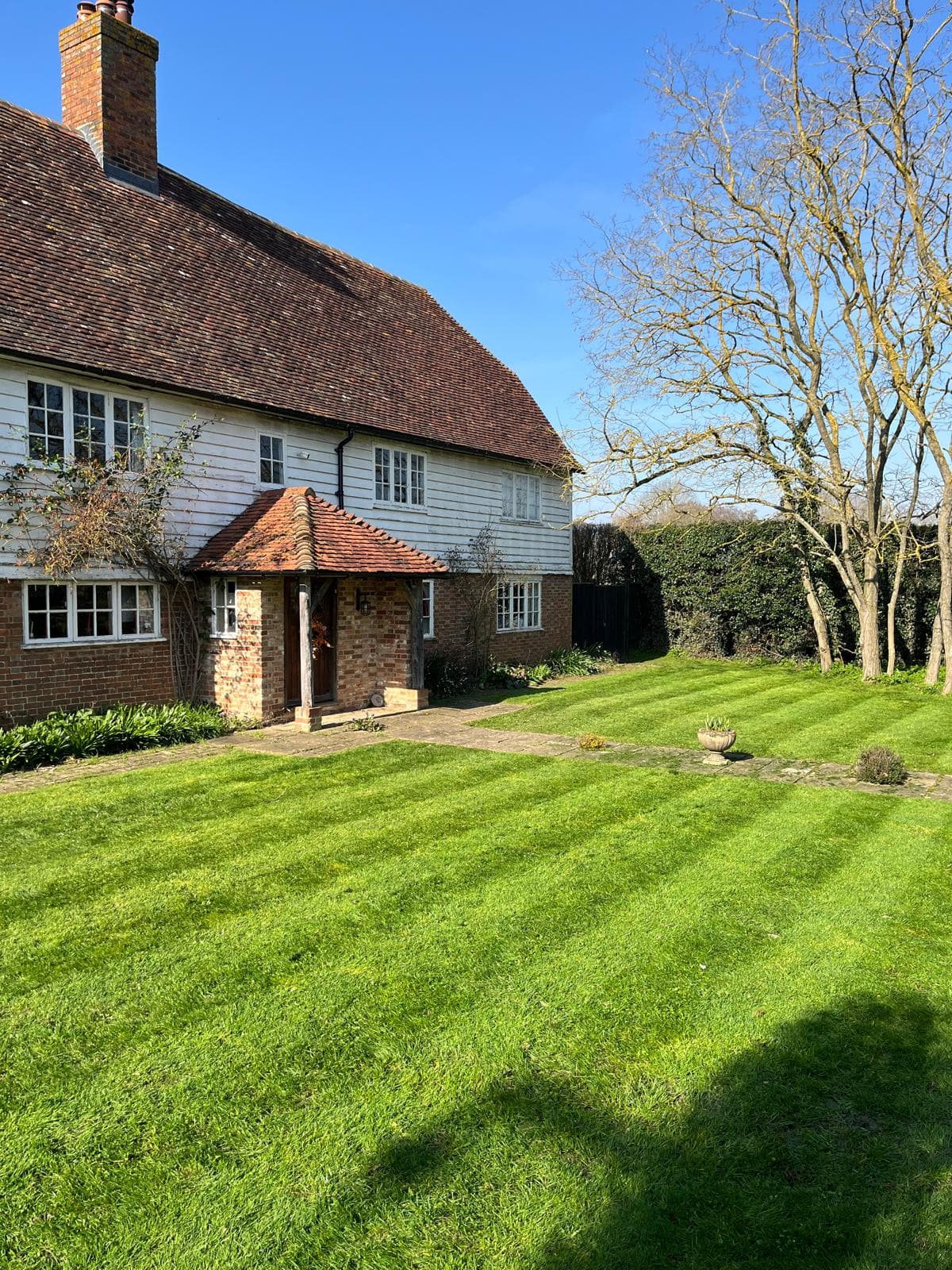 Front lawn with crisp stripes